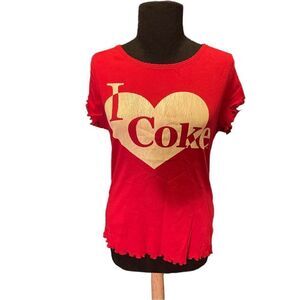 NWT
Coca-Cola
Red Guenuine Tee Shirt
Size: L